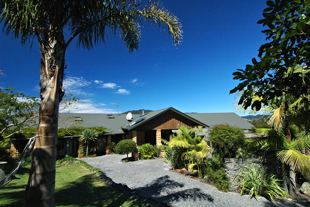 Coromandel: Tairua Boutique Inn — Exterior Entry. Photo © Home At First.