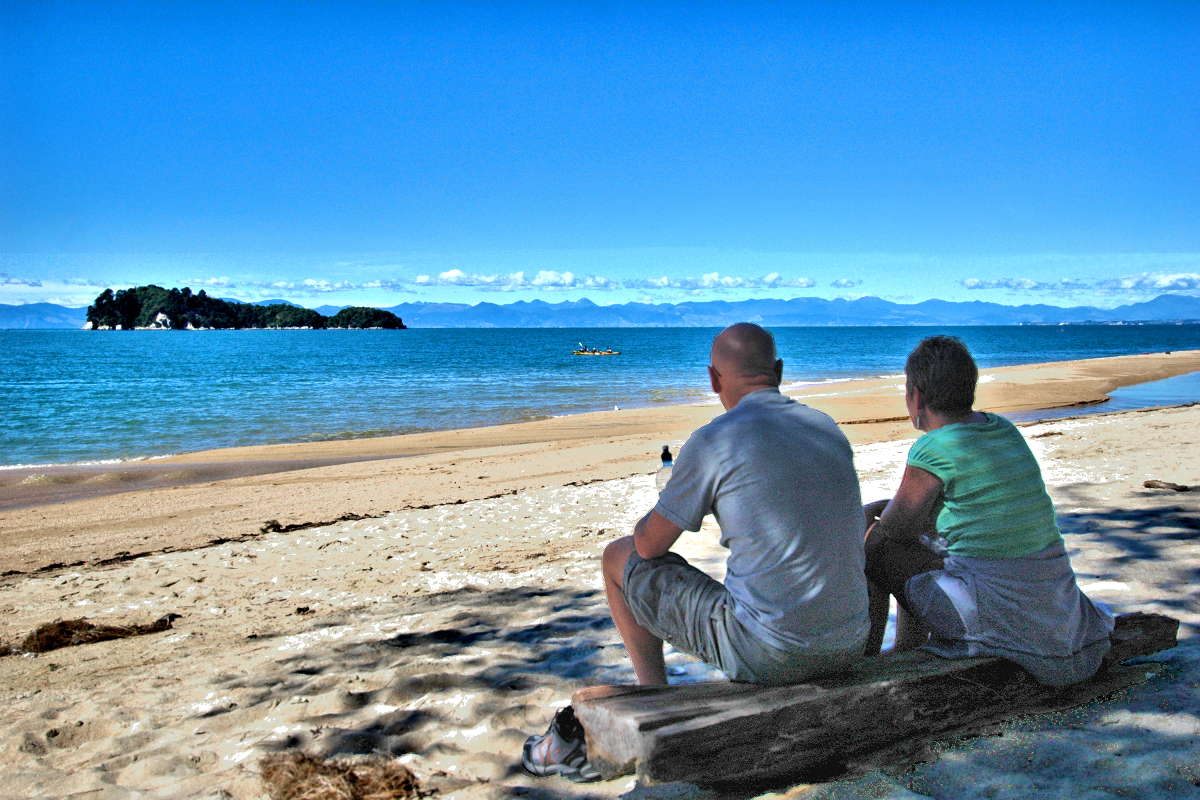 Nelson Region: Tasman Bay beach couple. Photo © Home At First.