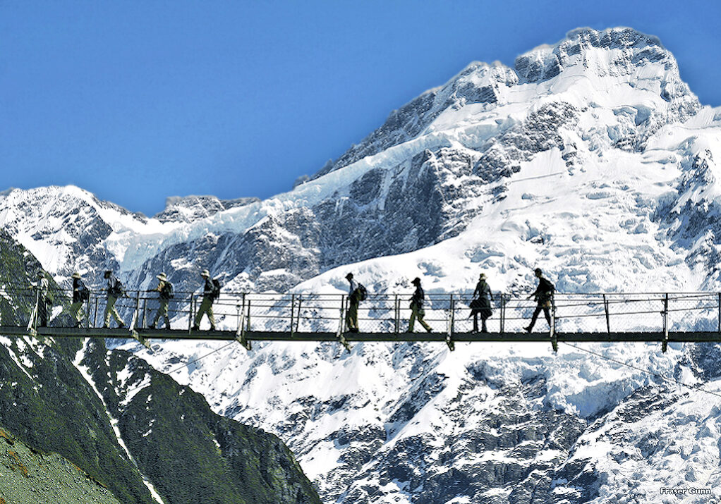 Mackenzie Country - Hooker Valley hikers on swing bridge - Mt Cook NP. Photo credit Fraser Gunn - NZ Tourism.