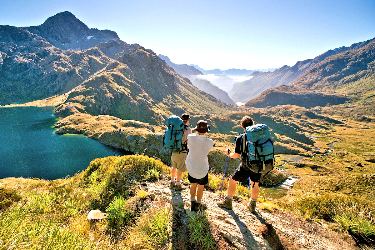 Fiordland - Hikers on Harris Saddle. Photo credit Stewart Nimmo - NZTourism.