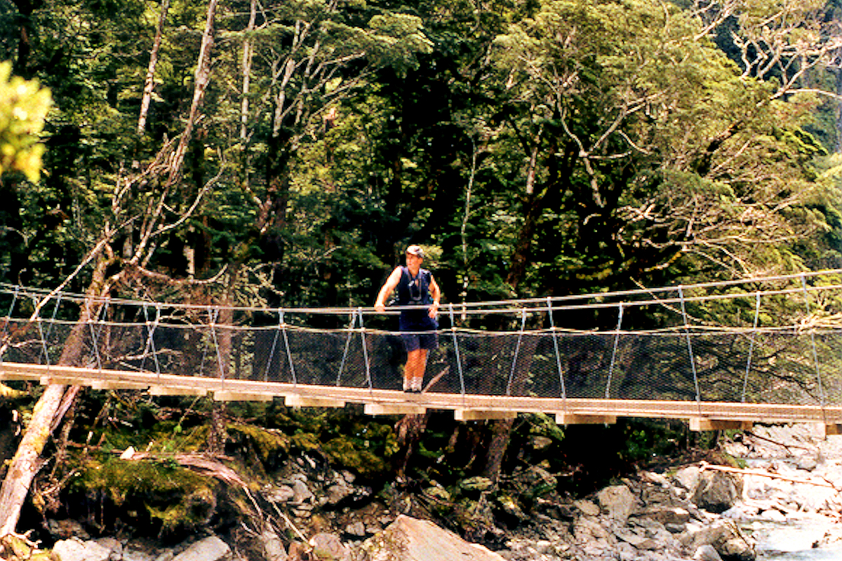 Routeburn Track - Mitch on Swing bridge. Photo © Home At First.