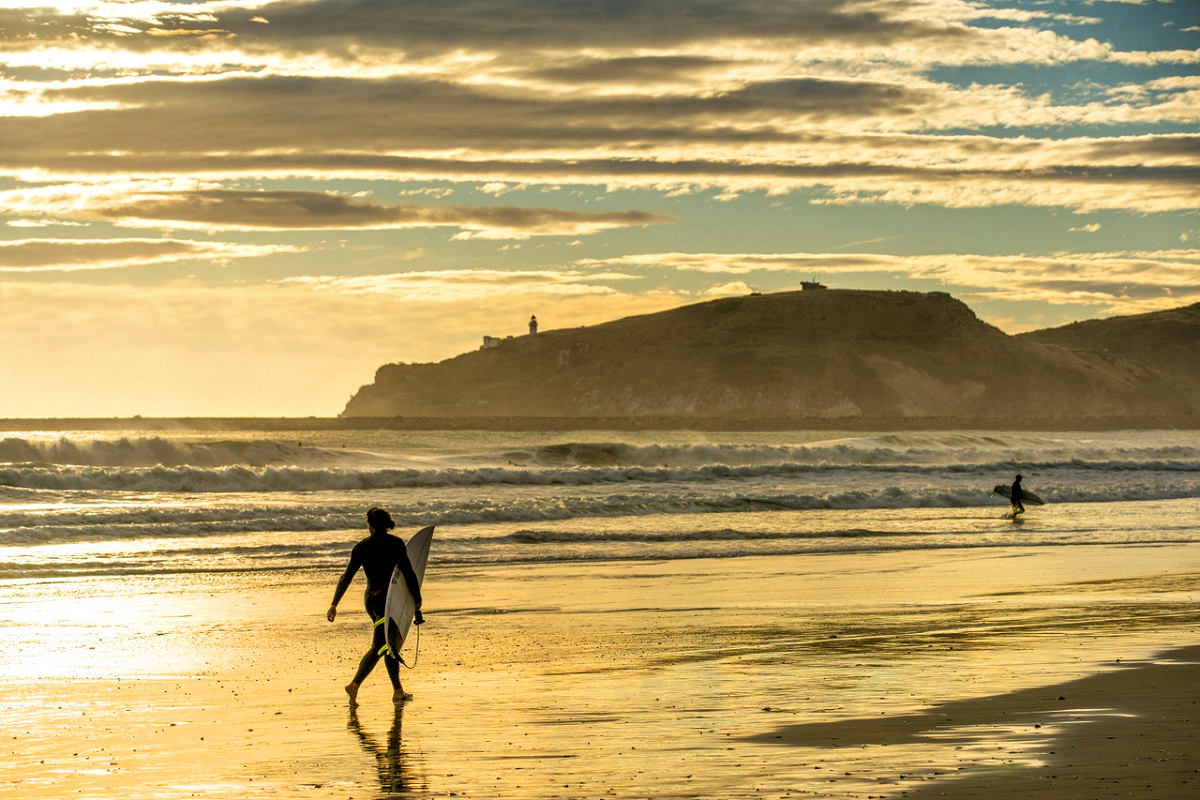 East Coast: Dunedin - Aramoana Beach Surfing. Photo credit DunedinNZ.