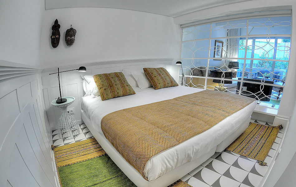 1-Bdrm Apt: Double-twin-bedroom behind the glass wall. Photo courtesy the owner.