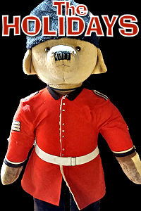 London - Christmas Paddington in Uniform. Photo © Home At First. Happy Holidays 2024!