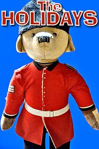 London - Christmas Paddington in Uniform. Photo © Home At First. Happy Holidays 2024!
