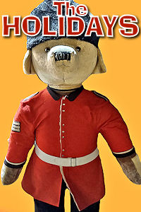 London - Christmas Paddington in Uniform. Photo © Home At First. Happy Holidays 2024!