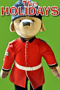London - Christmas Paddington in Uniform. Photo © Home At First. Happy Holidays 2024!