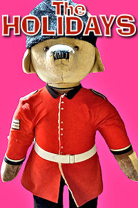 London - Christmas Paddington in Uniform. Photo © Home At First. Happy Holidays 2024!