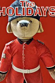 London - Christmas Paddington in Uniform. Photo © Home At First. Happy Holidays 2024!