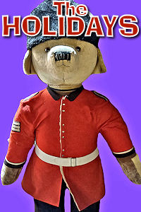London - Christmas Paddington in Uniform. Photo © Home At First. Happy Holidays 2024!