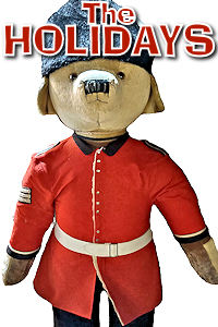 London - Christmas Paddington in Uniform. Photo © Home At First. Happy Holidays 2024!
