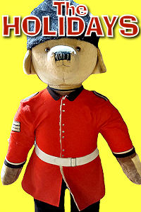 London - Christmas Paddington in Uniform. Photo © Home At First. Happy Holidays 2024!